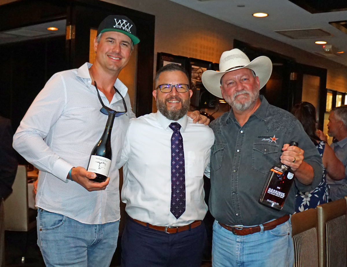 Three food and drink leaders in Houston. Chris Brundrett with William Chris Vineyards, Skip King with Morton's Steakhouse and Dan Garrison of Garrison Brothers Distillery