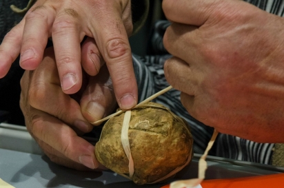 tying a white truffle