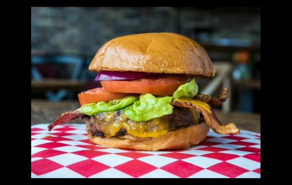Blacks Market Table Grilled BMT burger made with 44 Farms beef